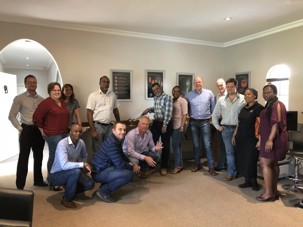 The team at Head Office celebrate the news of RPC Astrapak retaining Level 4 B-BBEE certification. From left: Jason Page (Group IT Manager), Michelle Bell (Executive Secretary), Sharyn Mowat (Group Demand Manager), Ilyaas Ally (Group Master Scheduler), Nawaaz Kalick (Procurement & Supply Executive), Futhi Buthelezi (HR Executive), Robin Moore (CEO), Nils Osberg (Product Development Administrator), Douglas Slogrove (Product Development Executive - Moulding Division), Thoko Dlamini (Cleaning Staff), Lungi Sibiya (Receptionist). Kneeling in front: Sipho Ndimande (Group Sales Administrator), Stephan Kappelsberger (General Manager Moulding & Manufacturing Re - Engineering Exec), Craig Schaffler (Operations & Technical Executive).