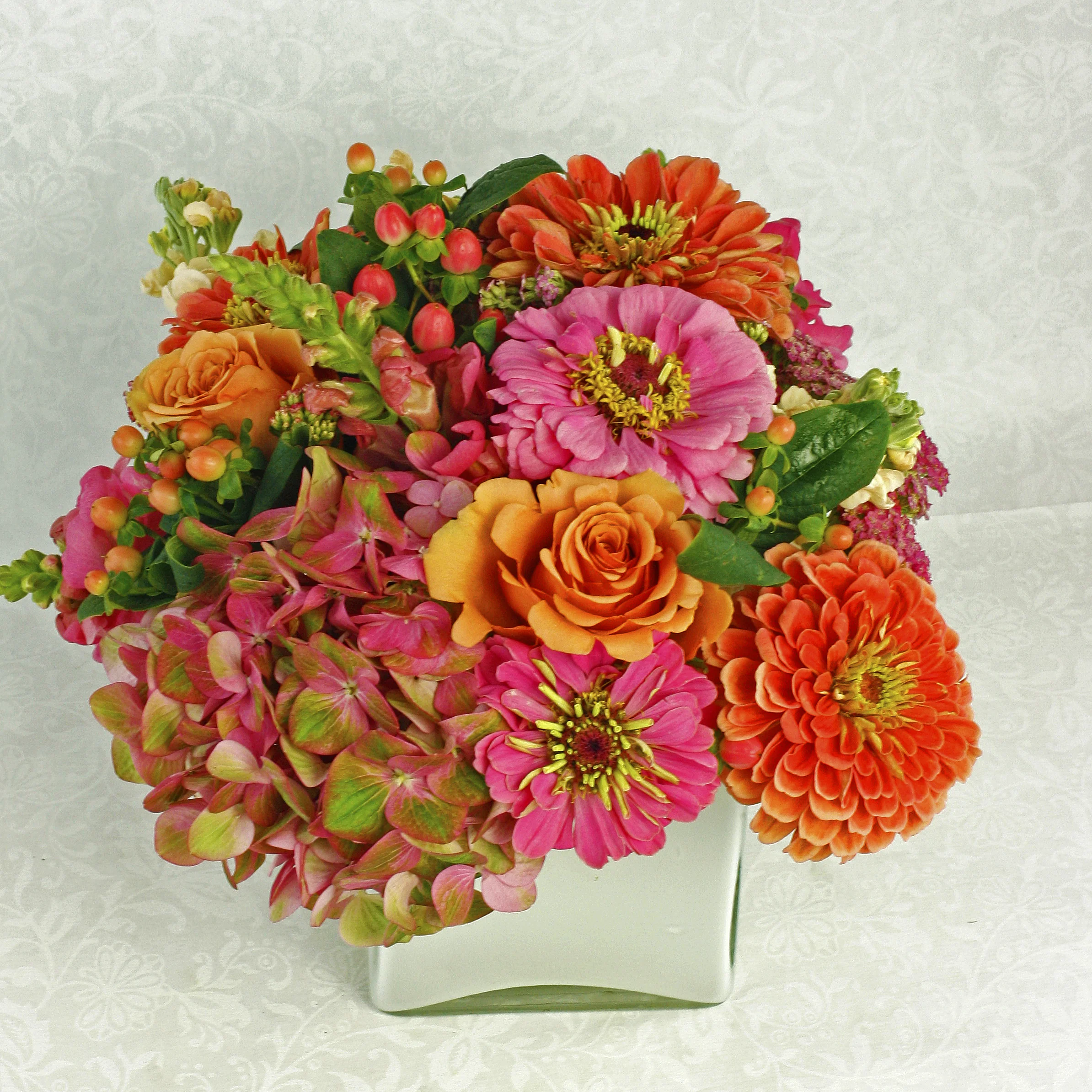 vibrant flowers in white cube.jpg