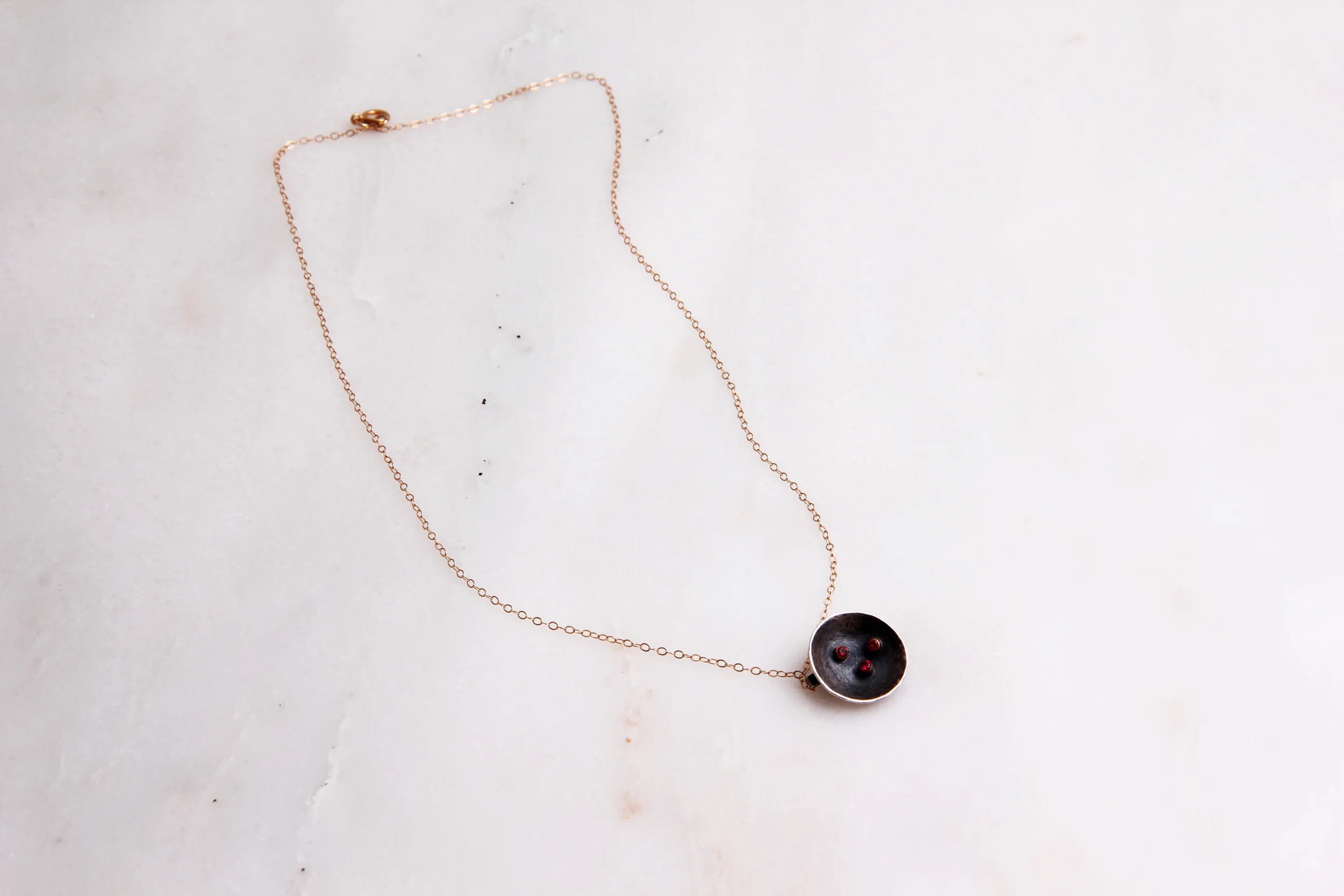 Simple circle pendent - Garnets and gold