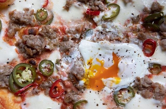 Our house sausage, pickled chilli, egg, mozzarella &amp; tomato pizza has been a mainstay and one of the most popular pizzas on our menu for a minute. One bite, and it&rsquo;s easy to understand why :) now available via our website: click &amp; colle