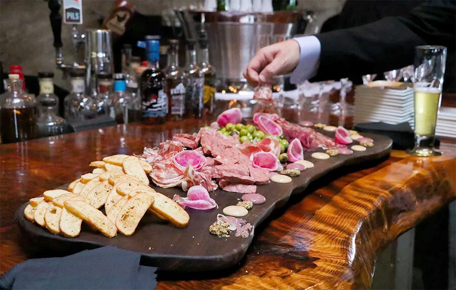House charcuterie board with salumi, crostini, and accompaniments at Valette Restaurant
