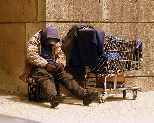 Photo: "Homeless Man" by Matthew Woitunski - Own work. Licensed under CC BY 3.0 via Wikimedia Commons