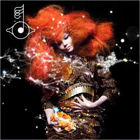 On the cover of Biophilia , Björk plucks her bodice with one hand while holding what looks to be Mexican creedite with the other.