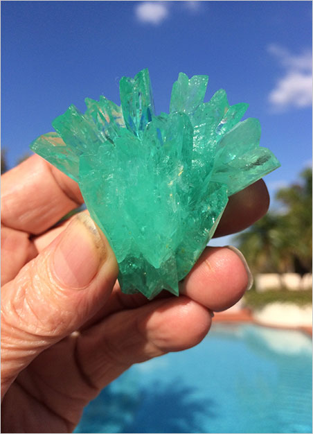 Sun king. The coveted specimen catches some rays. Phosphophyllite receives the second half of its name from phyllon, Greek for "leaf," in reference to its perfect cleavage. (Photo: Bill Larson)