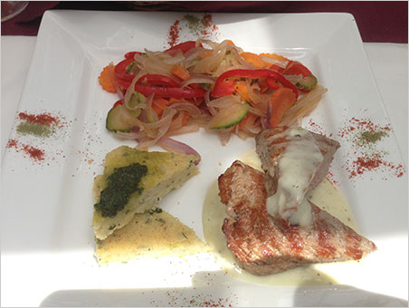 I'll have the lamb, er, llama. As with the phosphophyllite, a menu description is only so useful. Above, wedges of llama and potato gateau, sautéed vegetables, green pepper sauce. (Photo: Will Larson)