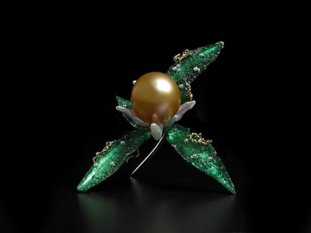 Moldavite Brooch , designed by John Hatleberg, private owner. We featured this pin in a 2014 profile of Hatleberg. Moldavite is created from meteorite impact. This jewel is featured in the upcoming exhibition, "Out of This World! Jewelry in the Space Age," which we looked at last month in our sibling e-publication. (Photo: Tony Pettinato, courtesy Carnegie Museum of Natural History, Pittsburgh)