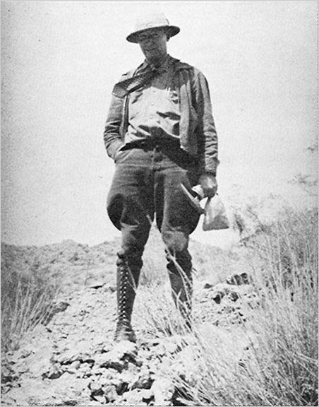 Holmes is shown prospecting on Soledad Mountain in 1935, the year after his historic gold strike.