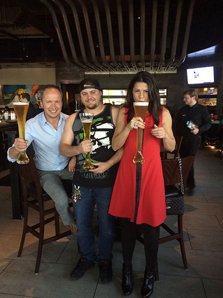 Alan Hart, Carl Larson and Raquel Alonso-Perez say, "Cheers!" (Photo: Patrick Dreher)