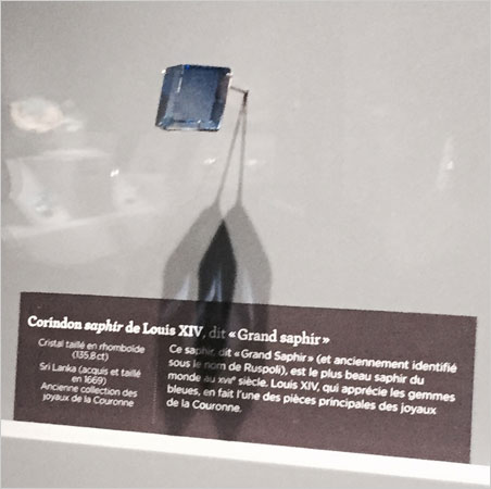 Wooden Spoon-Seller's Sapphire. From the exhibition caption: Corundum sapphire of Louis XIV, called "Great Sapphire"/ Crystal cut in rhomboid/ Sri Lanka (acquired and cut in 1669)/ Formerly in the collection of the crown jewels/ This sapphire called "Grand Sapphire" (and formerly identified as the Ruspoli), is the most beautiful sapphire in the world in the seventeenth century. Louis XIV, who enjoyed blue gems, made it one of the main pieces of the crown jewels. Hughes (1997, 238) attributes this sapphire's original moniker to S. M. Tagore, who wrote that it was found by a spoon seller in Bengal. A Roman prince named Ruspoli later sold it to the salesman from whom it was acquired by Louis XIV. We will feature more images of this famous jewel in our sibling publication , Palagems Reflective Index , on February 16. (Photo: Bill Larson)