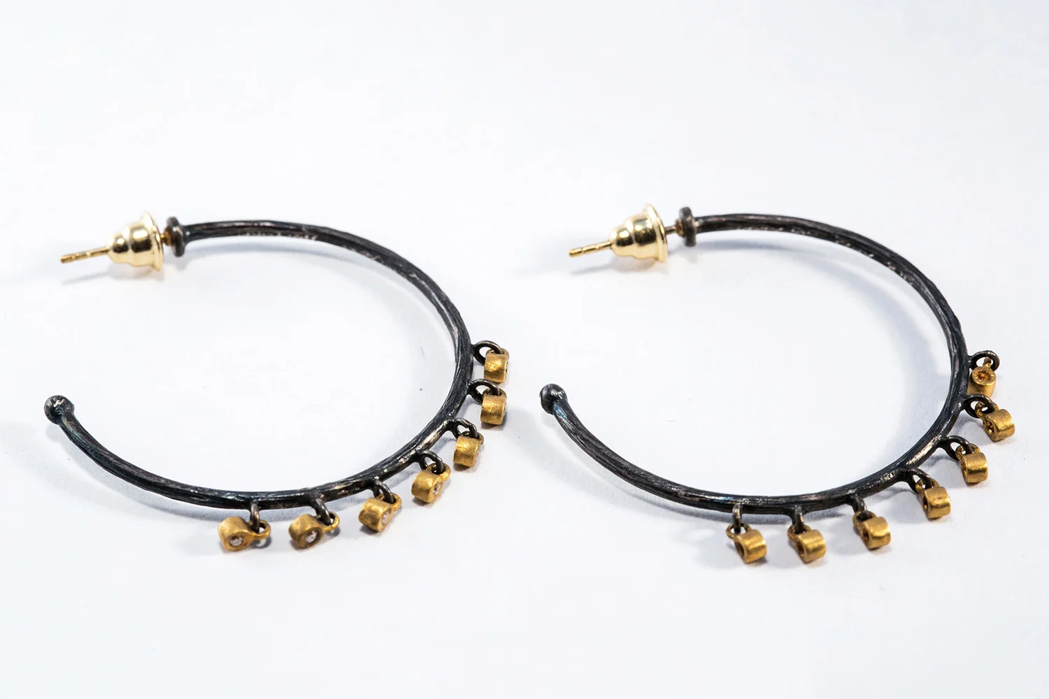 Sterling-Silver-and-Yellow-Gold-Hoop-with-Diamonds.jpg