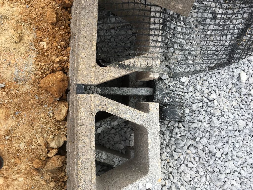 Retaining wall back drain, weeps and stone backfill.jpg