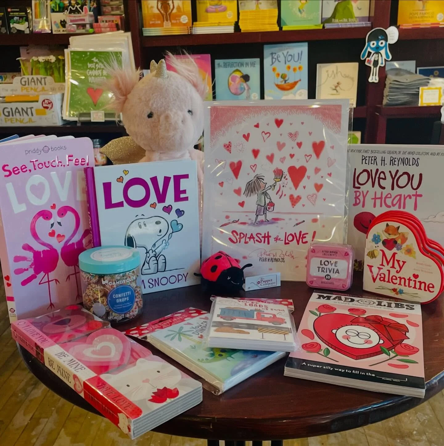 SPECIAL! Free &ldquo;Splash the Love&rdquo; print by @peterhreynolds with any purchase $25 or more of Valentine books or gifts until February 10th! We are now open Sundays until 5 PM- and our caf&eacute; is open early every morning, seven days a week