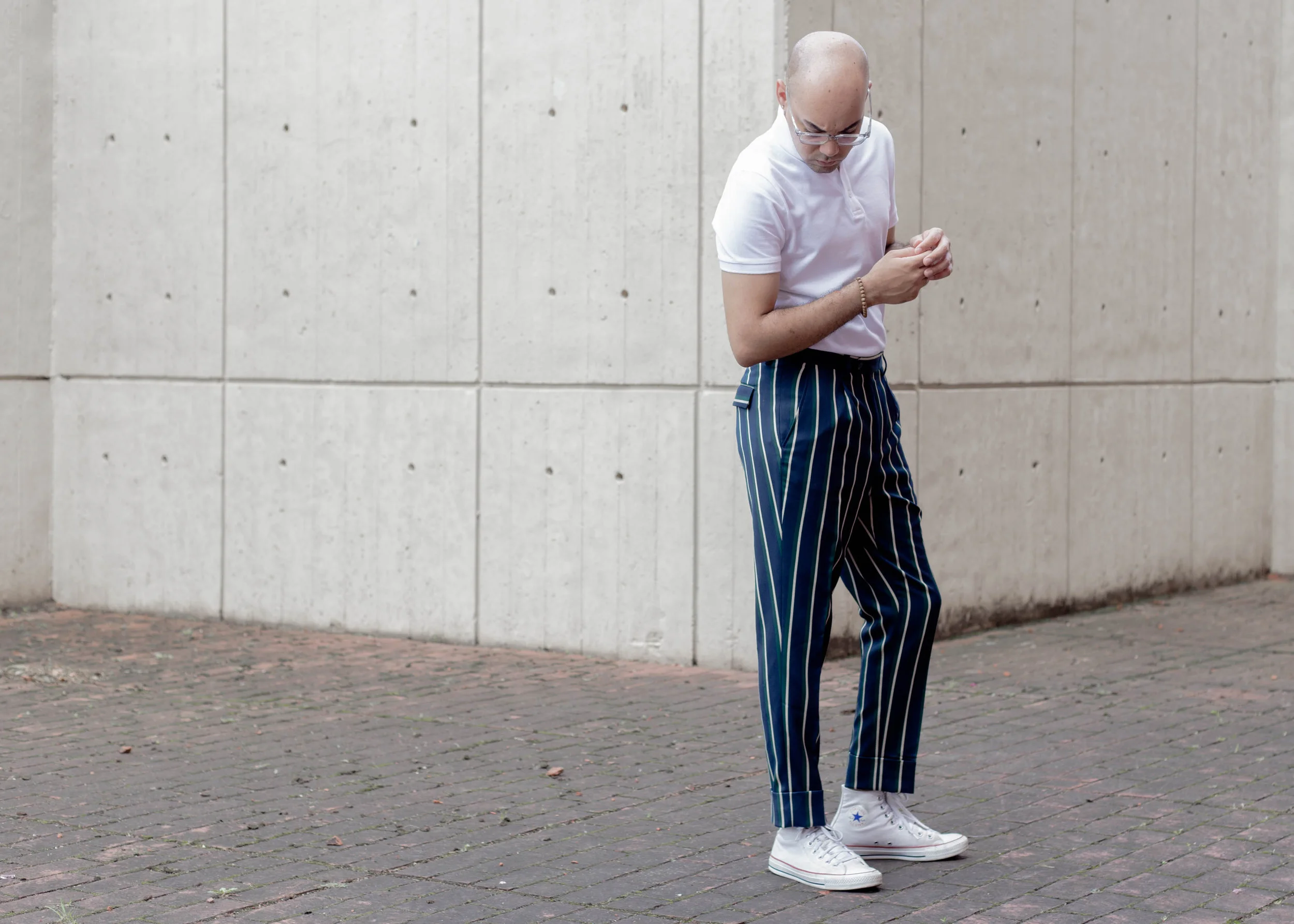 wide-striped-trousers-solid-polo-look-down-full.jpg