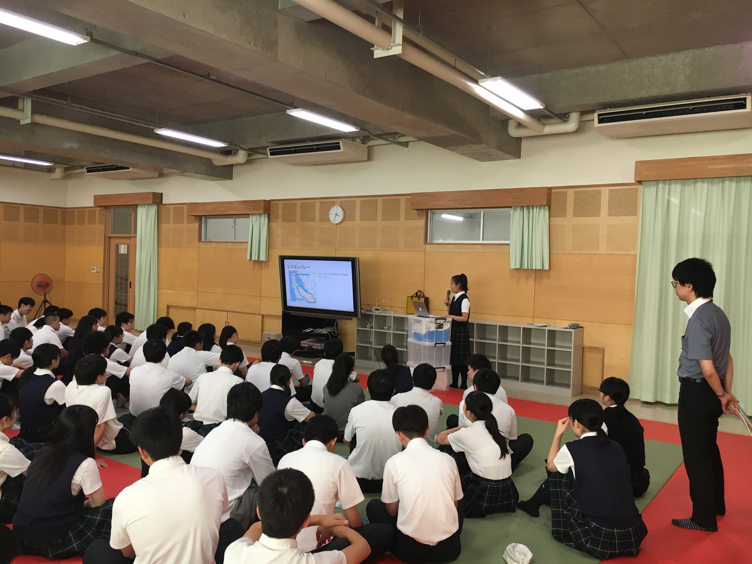Sakurako Nyudo presenting on the US-Japan relationship at her high school.
