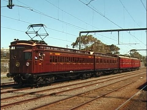 A 2002 recreation of an E-Train of the type that ran to Warburton in the 1930s. The 'Swing Door' (also known as 'Dog Box' ) electric cars at the front towed the country carriages at the back to the suburban terminus at Lilydale, where a steam engine took over for the second half of the journey. Photo © James Brook. Used with permission. Video of the recreated trip .