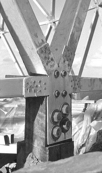  Joint details at the base. In the background are the piles of floorboards.&nbsp;Slightly thicker floorboards were used so that the spacing of the joists could be increased. 