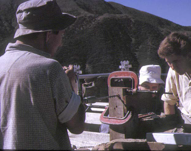 Drilling the tops of the red gum posts to take the first level of joints.