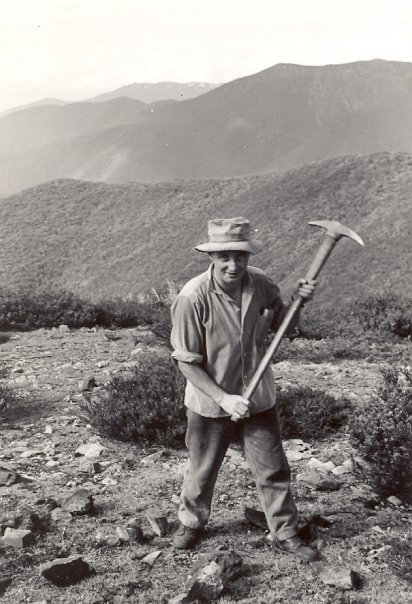  Dave Allen about to make the first swing to start the foundations and excavation. 