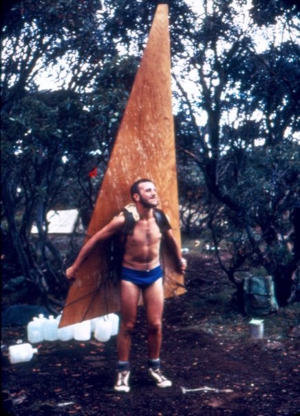  Tom Kneen carrying in a section of the suspended bunk floor. 