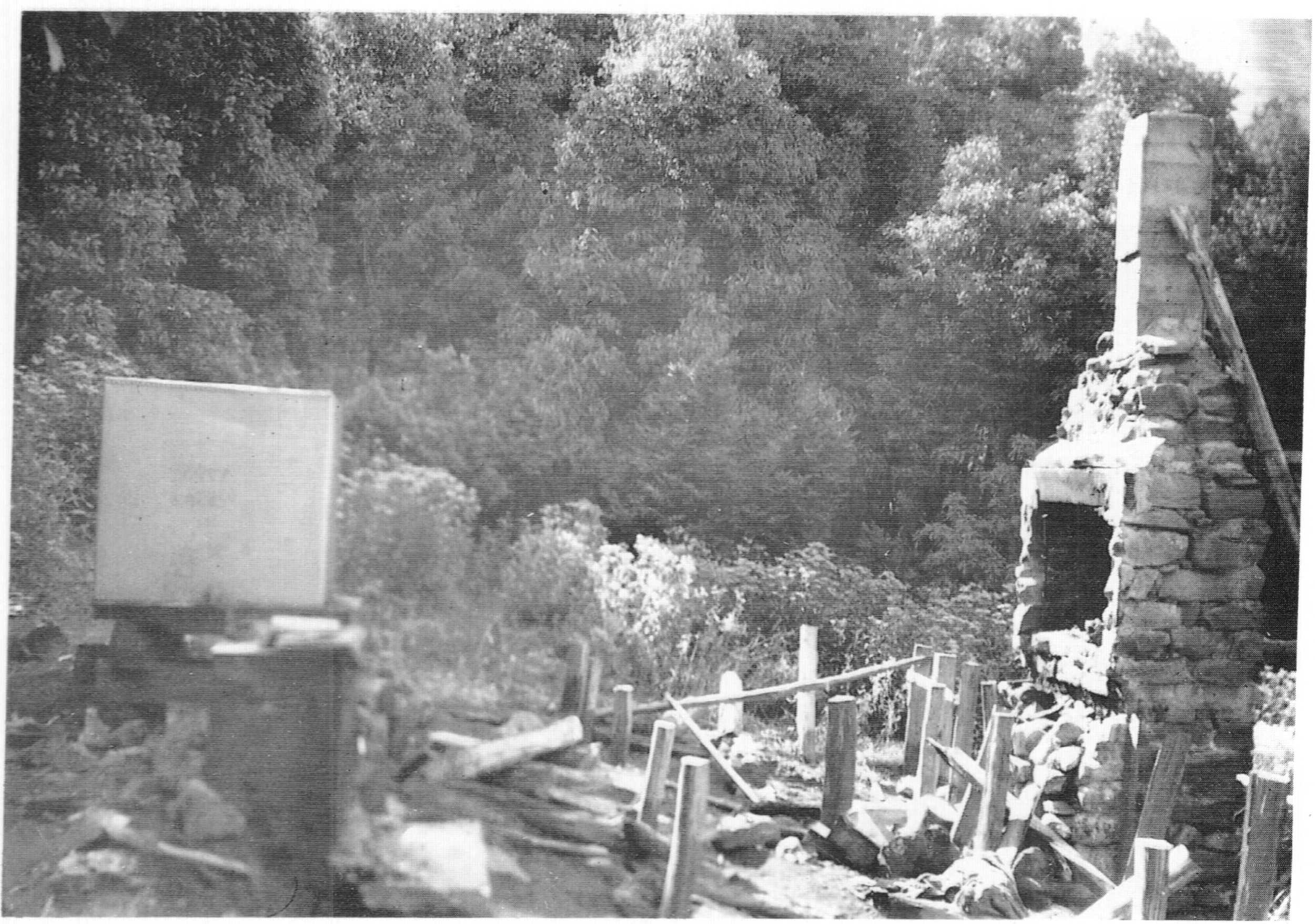 Scene after the cabin was moved to Buller. The tank has since rolled to below the chimney