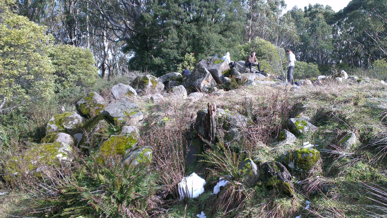 Large stone rubble south of the summit shelter hut. This is probably the remnants of the ski jump take off ramp that was rebuilt in 1951, but it's difficult to be sure. © David Sisson.