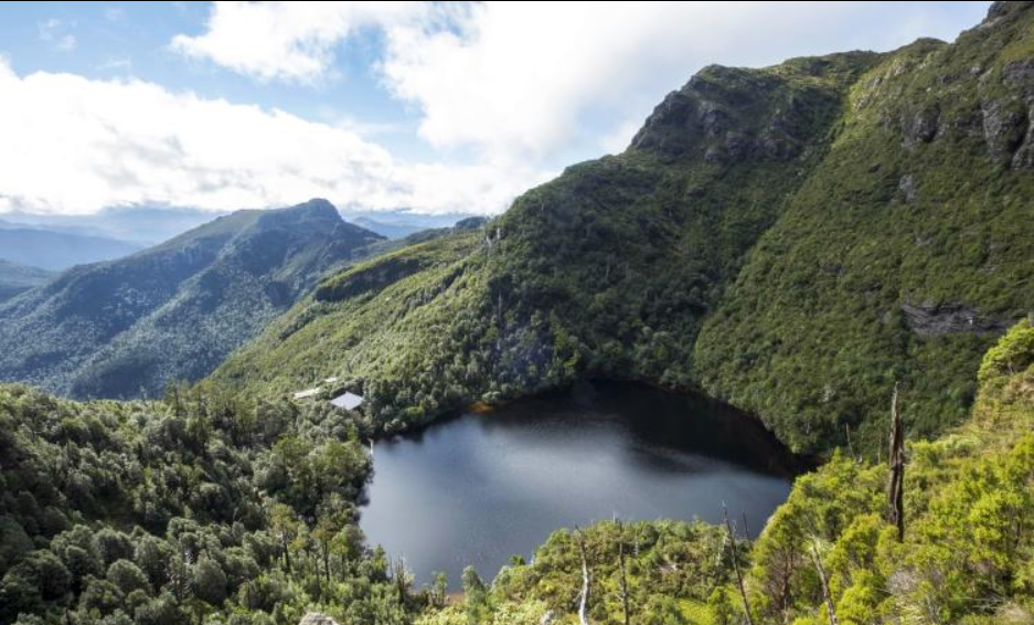 Third Lake Tahune Hut from the base of Frenchmans Cap cliffs. From Green Design site
