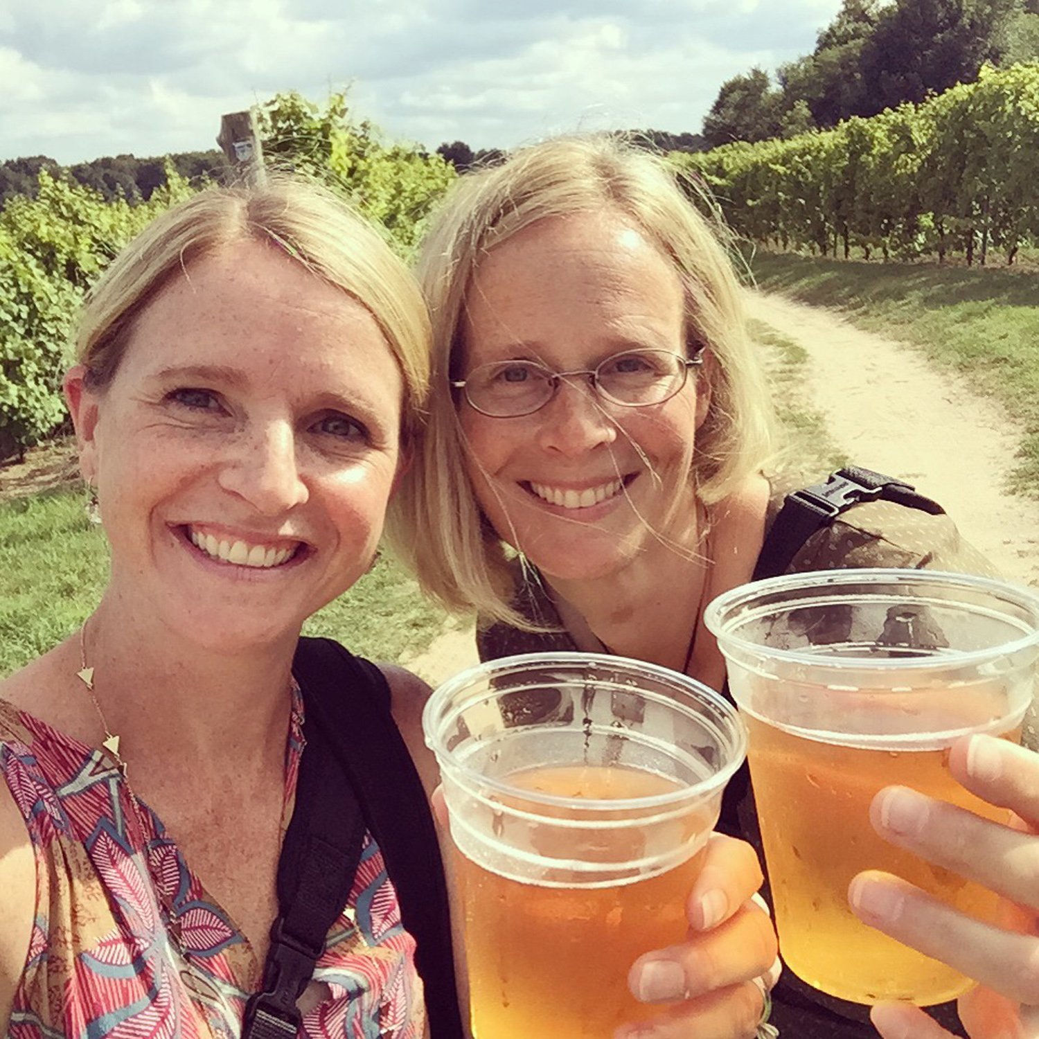  being offered cider while shooting a vineyard wedding - what a perk! 