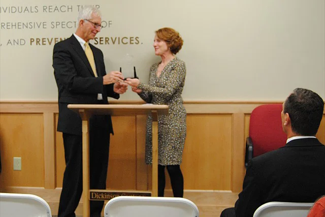 Lisa Davis, PORH Director present the award to Jack Goga, DCI CEO