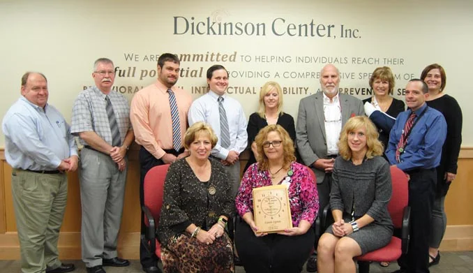 Back Row: Jim Dixon, DCI Board Member; Dennis Crotzer, DCI Board Member; Joe Haines, DCI Board Member; Mike Fernan, DCI; Denise Geyer, DCI; Bill Conrad, DCI Board Member; Irene Davido, DCI; Jim Prosper, DCI; Abbi Peters, DCI Board Member Front Row: Fran Kuhns, DCI Board Chair; Laura Sypien, Sis Simons Award Recipient; Heidi Thomas, DCI Interim Chief Executive Officer