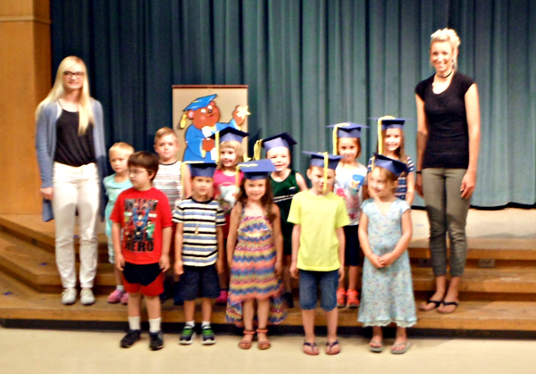 Photo of DCI staff with children