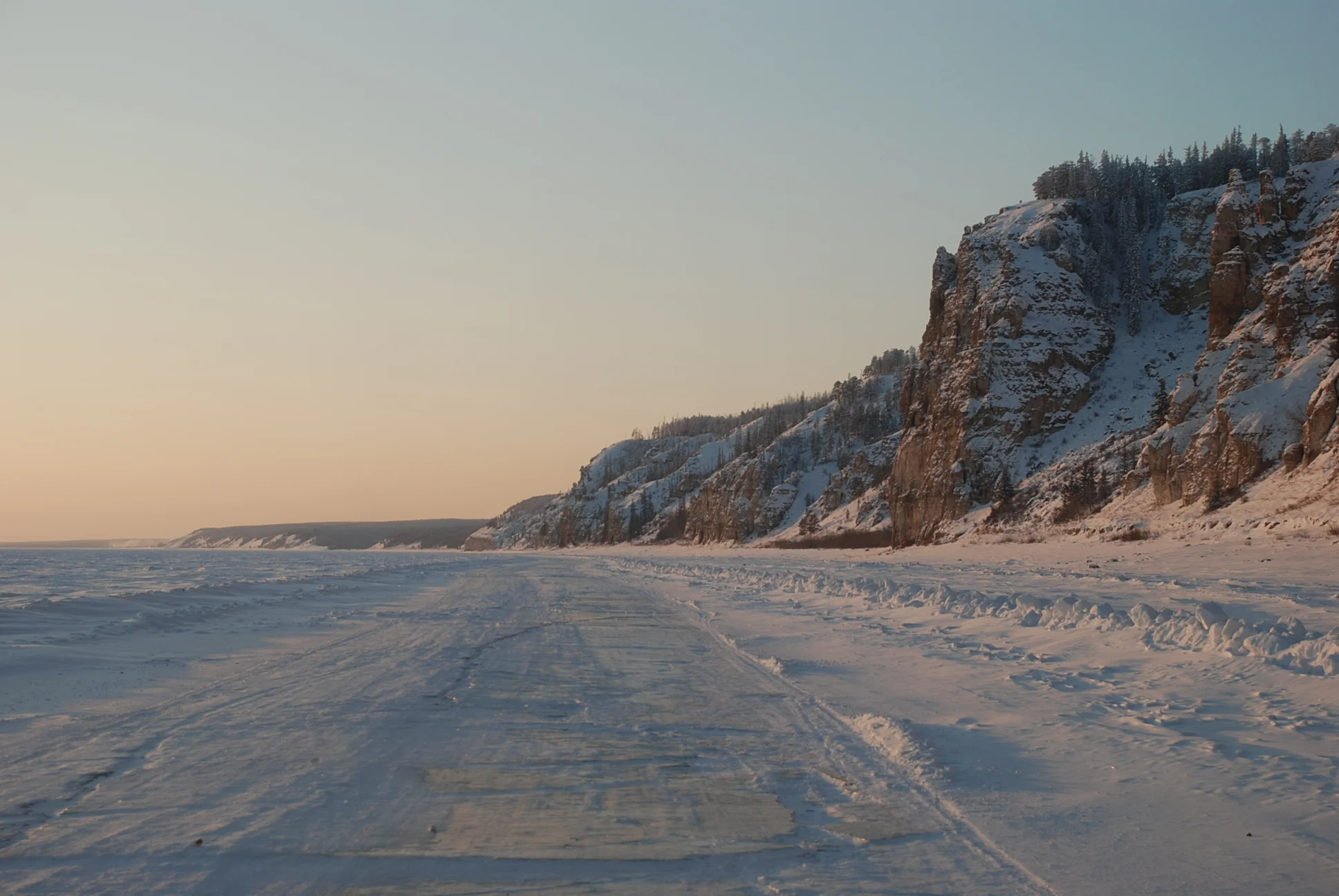 Banks of the frozen river Lena.JPG