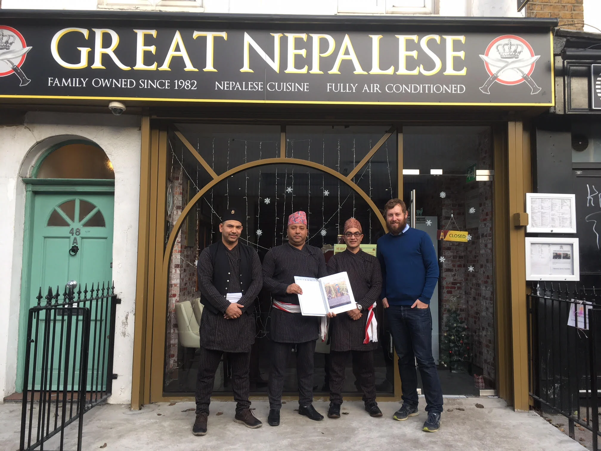 From left to right: Kiran, Baz and Jitendra Manandhar with TGT Co-Director Morgan Phillips at The Great Nepalese Restaurant. 