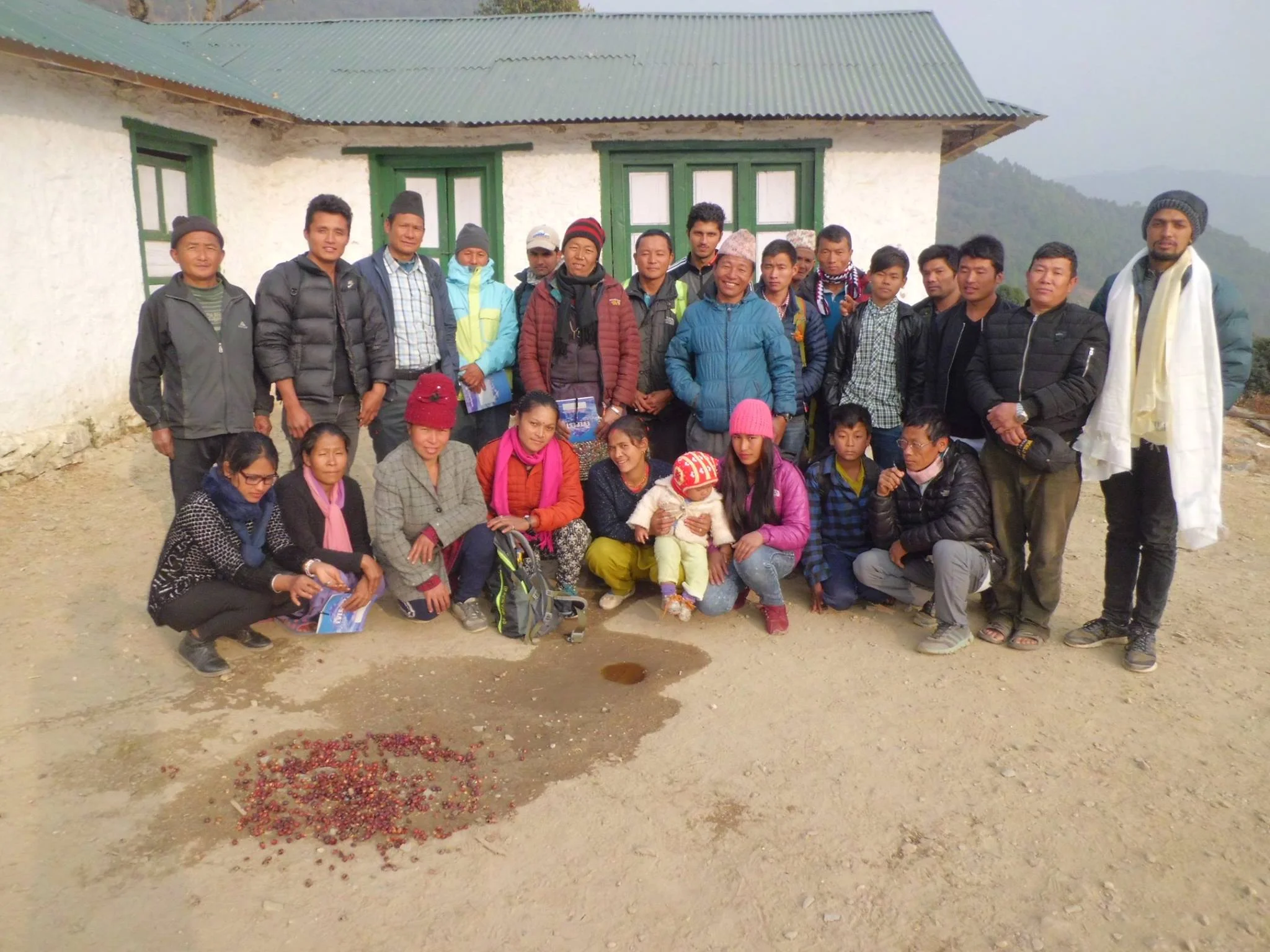 Hari Kumar Kharki (right of picture, wearing white ceremonial scarves) with farmers in Waku, January 31st 2018. 