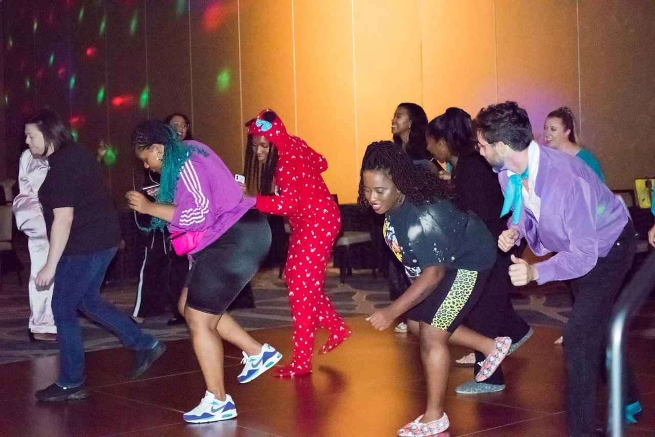 Attendees dancing together at the PCOS CON 2019 evening celebration