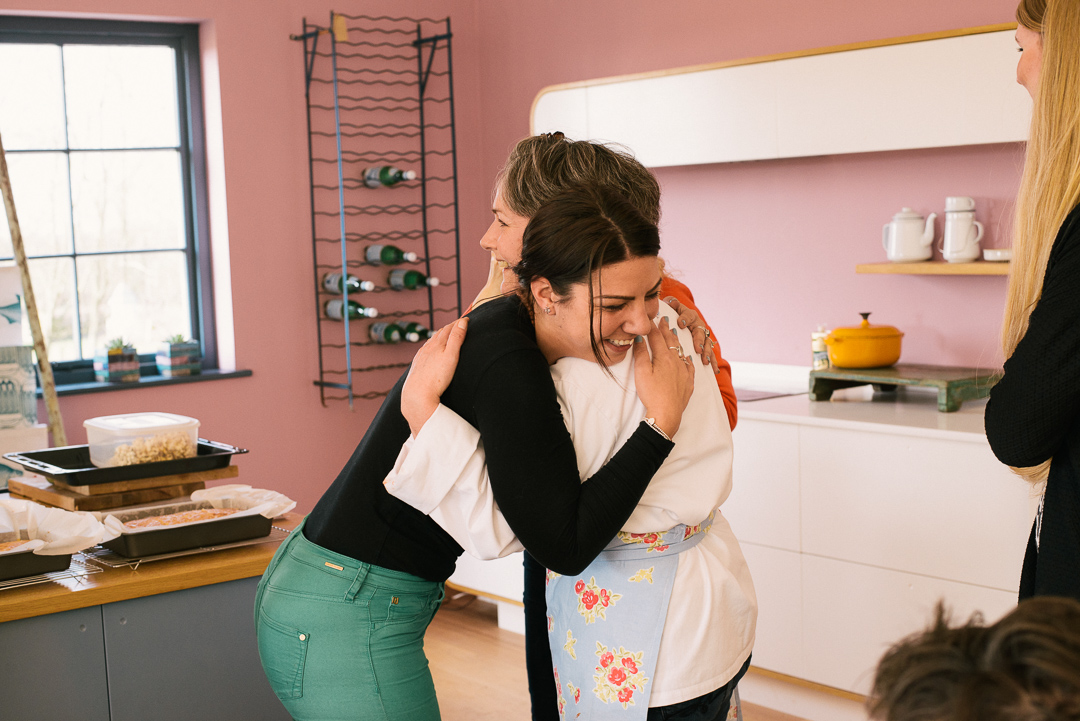 Jane being embraced by one of our production team - Rachel. 