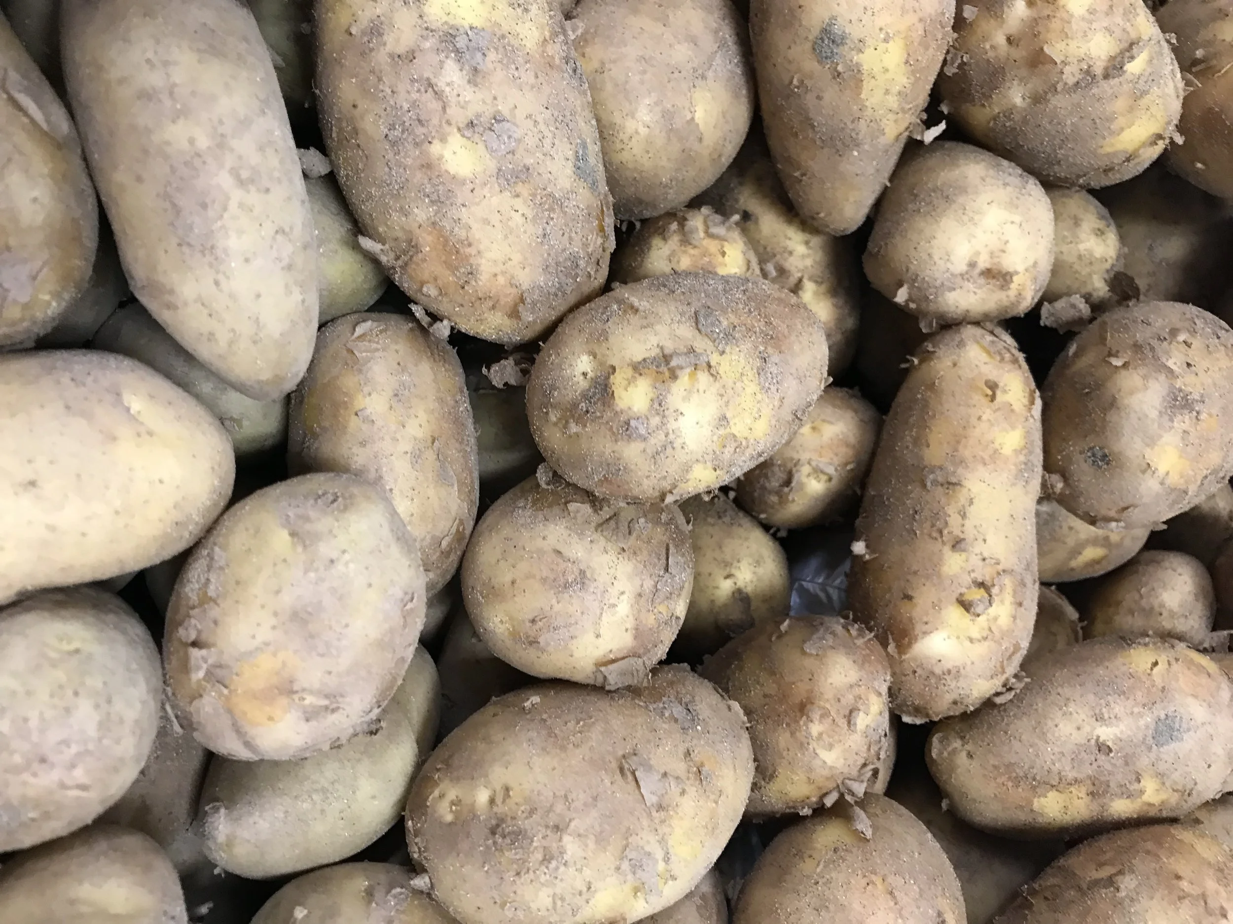 Your roasties won't cook if the oven is crammed full of other items. 