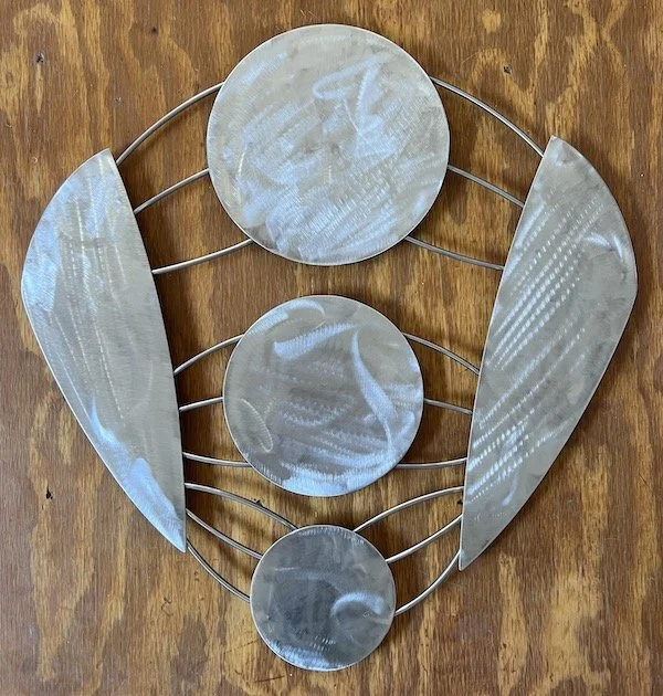 29" x 27", stainless steel, wall