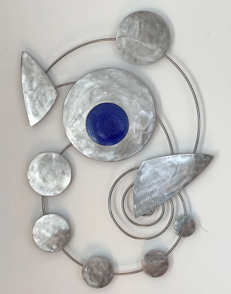 Stainless and glass, 32" x 22"