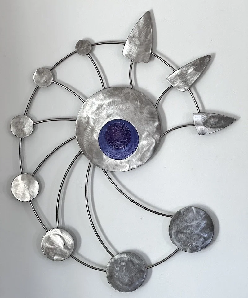 Stainless and glass, 31" x 25"