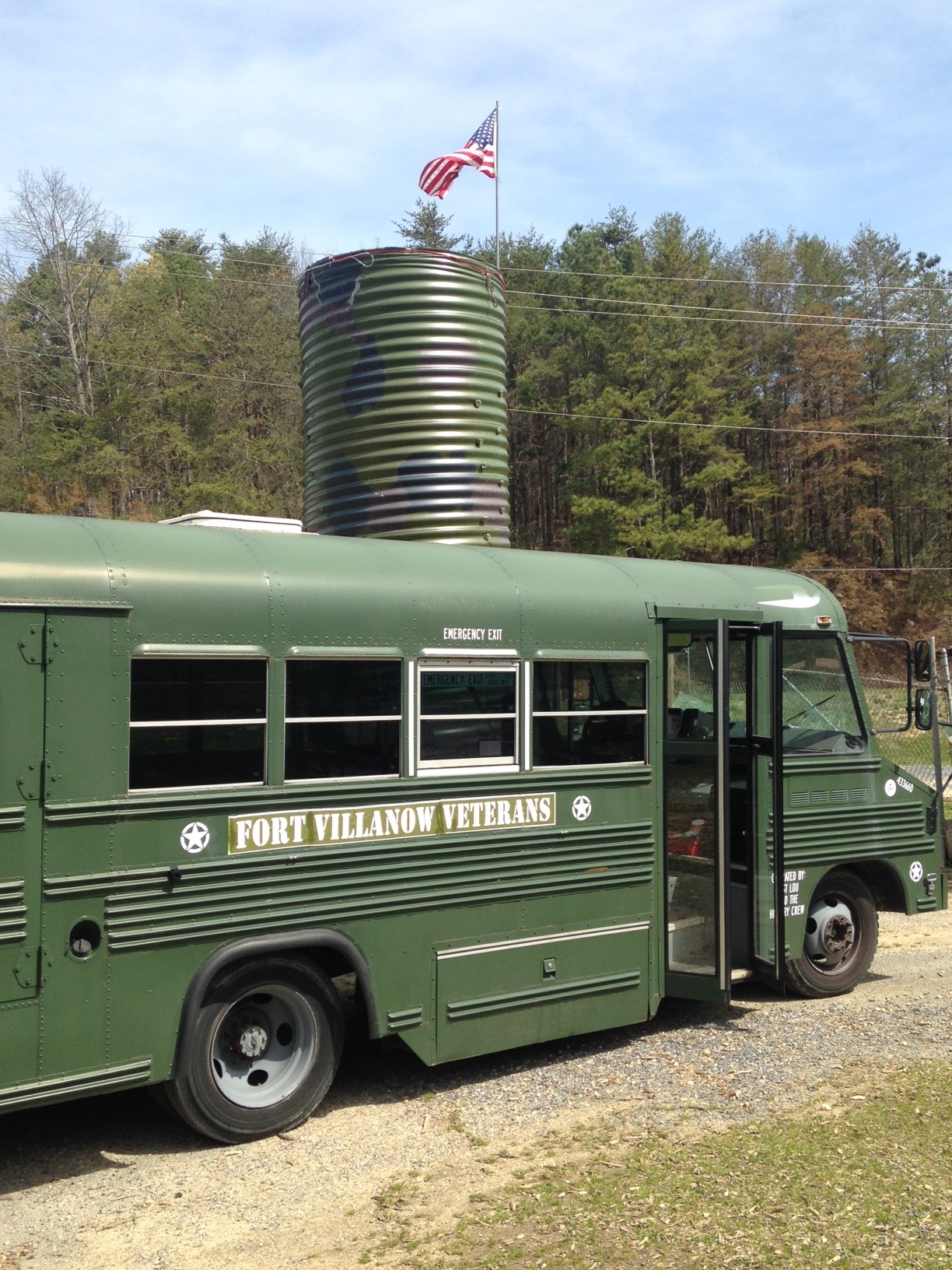 Bus, tower & flag on a sunny day.jpg