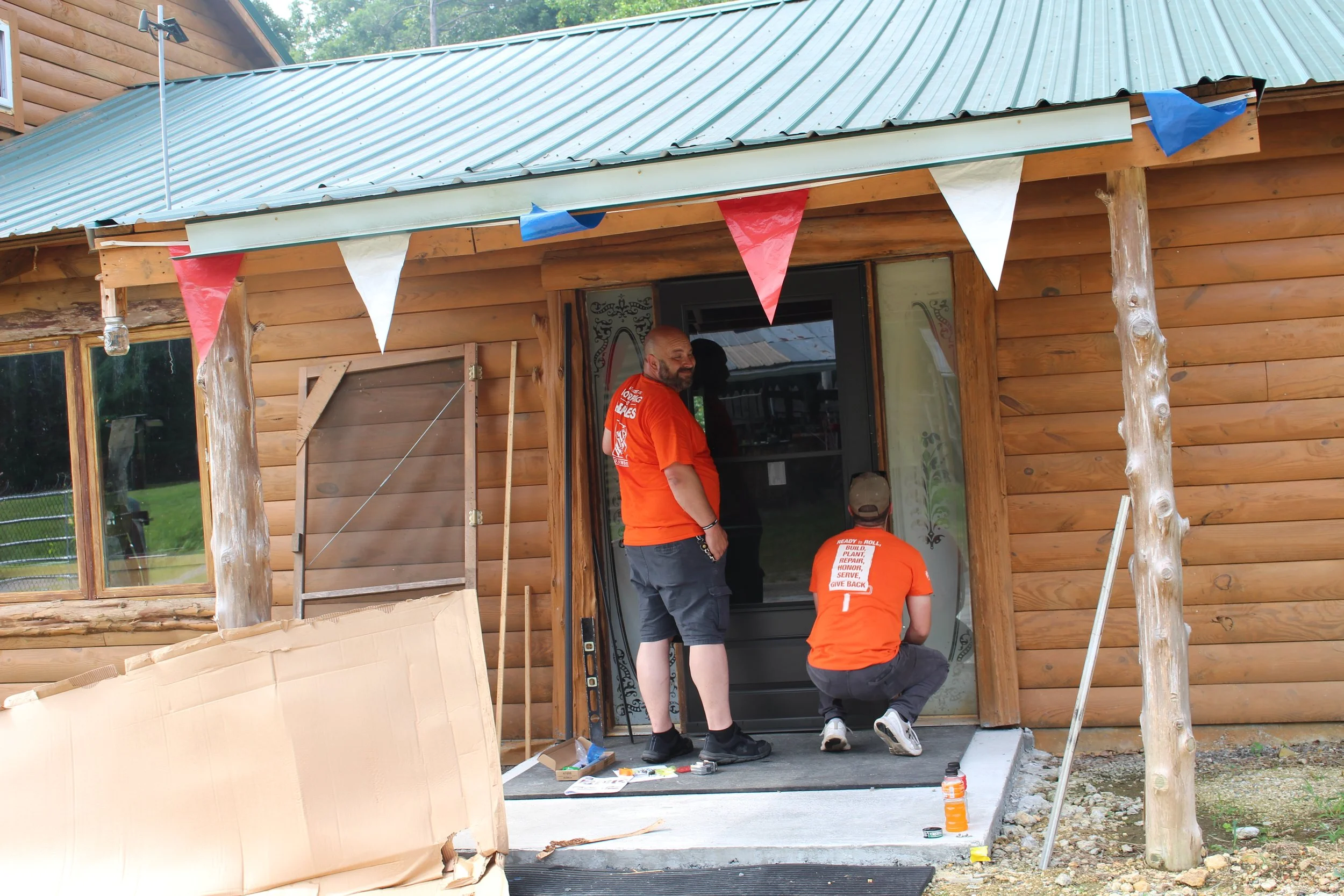 Home Depot, Lamar and Adam generously installed a storm door to our community building #1 2023.JPG