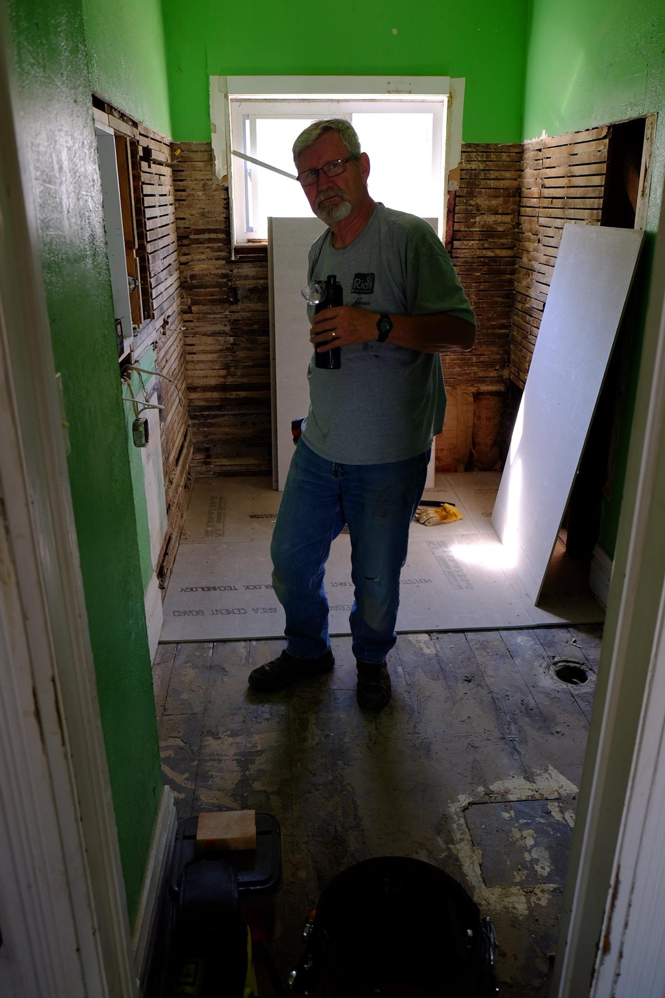 Bob rehabbing the bathroom of the Ransom street rehab.