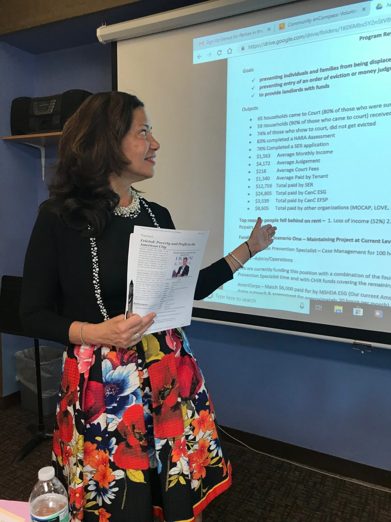 Judge Maria Ladas Hoopes (a major champion of EPP) presents the program to the Community enCompass board.