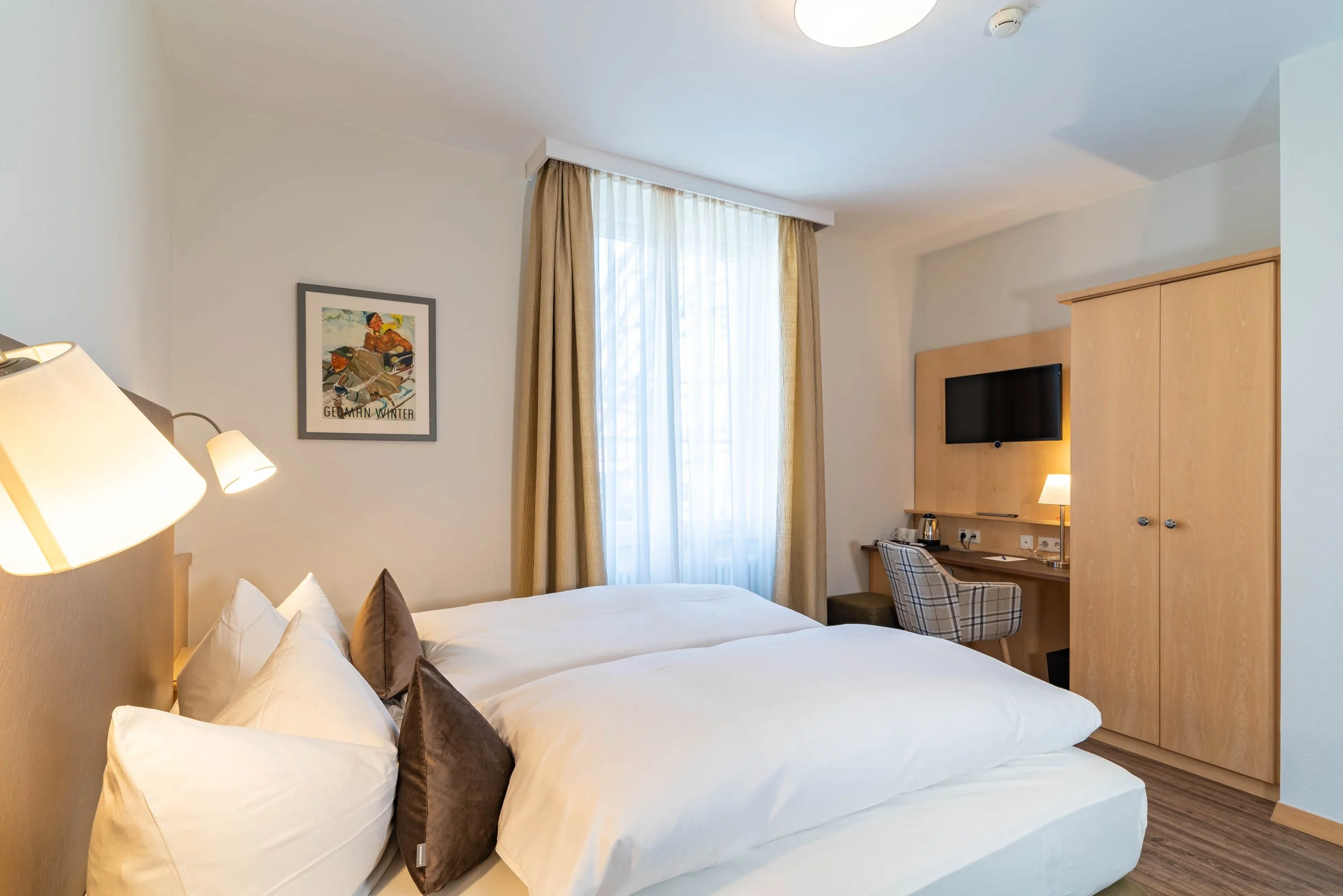 gemütlicher Schlafbereich im Apartment Amarena im Apartment Hotel Schreier in Lindau am Bodensee
