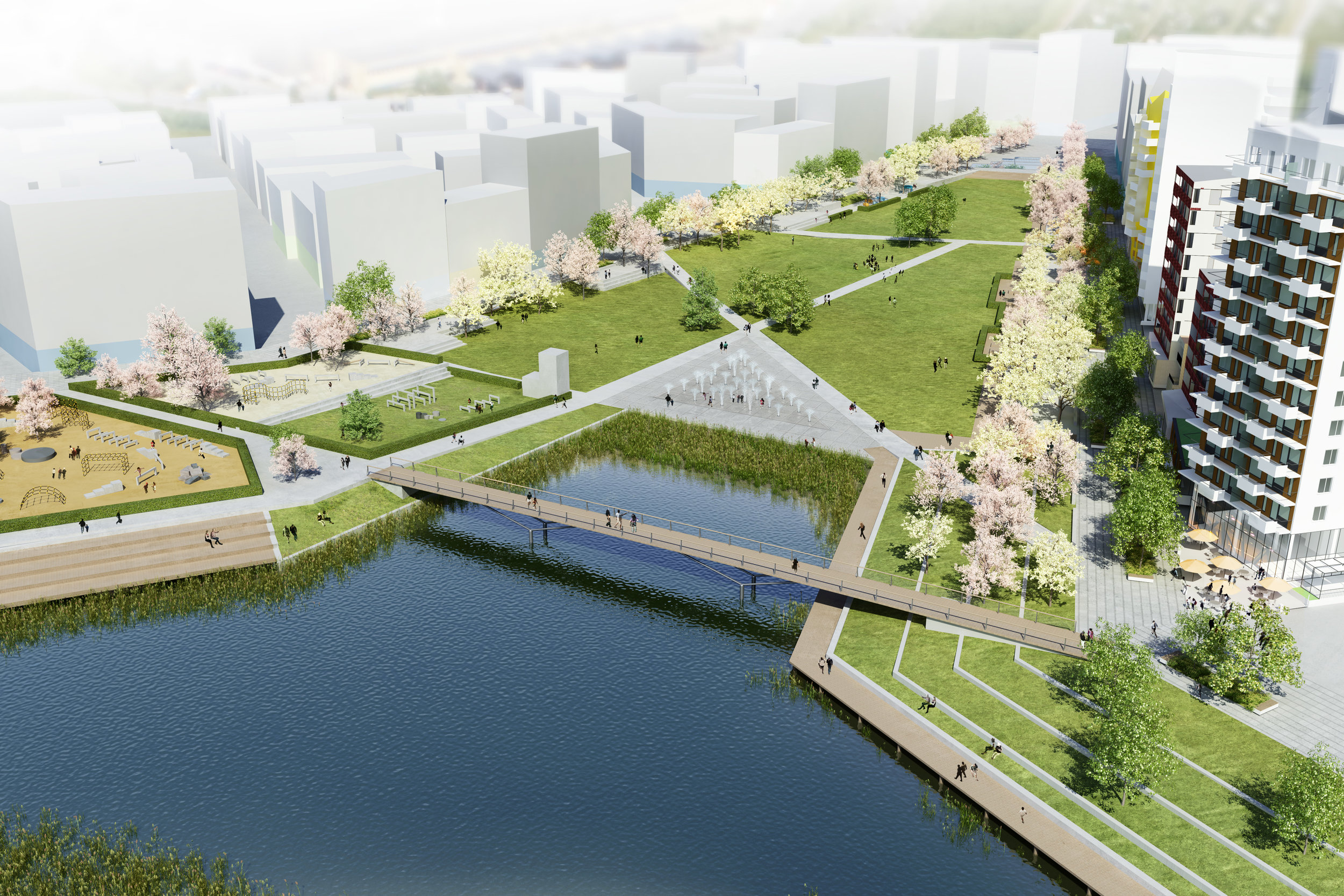 I stadsdelsparken finns öppna ytor, lekplatser och vattenspel.