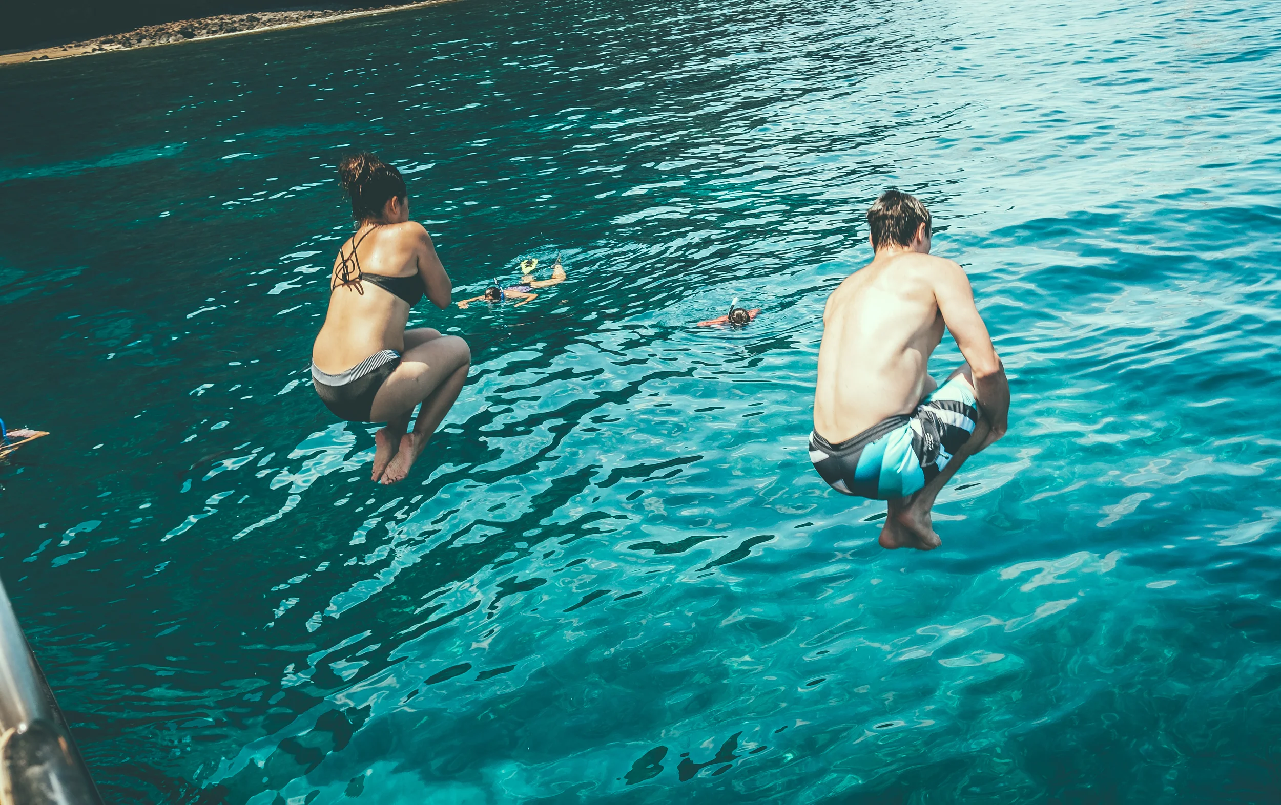 KAUAI_NA_PALI_COAST_AMY_DAN_JUMP.jpg