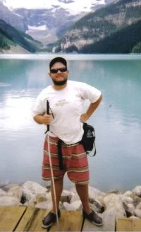 Tony Giles on the shore of Lake Louise in the Rocky Mountains, Alberta, Canada