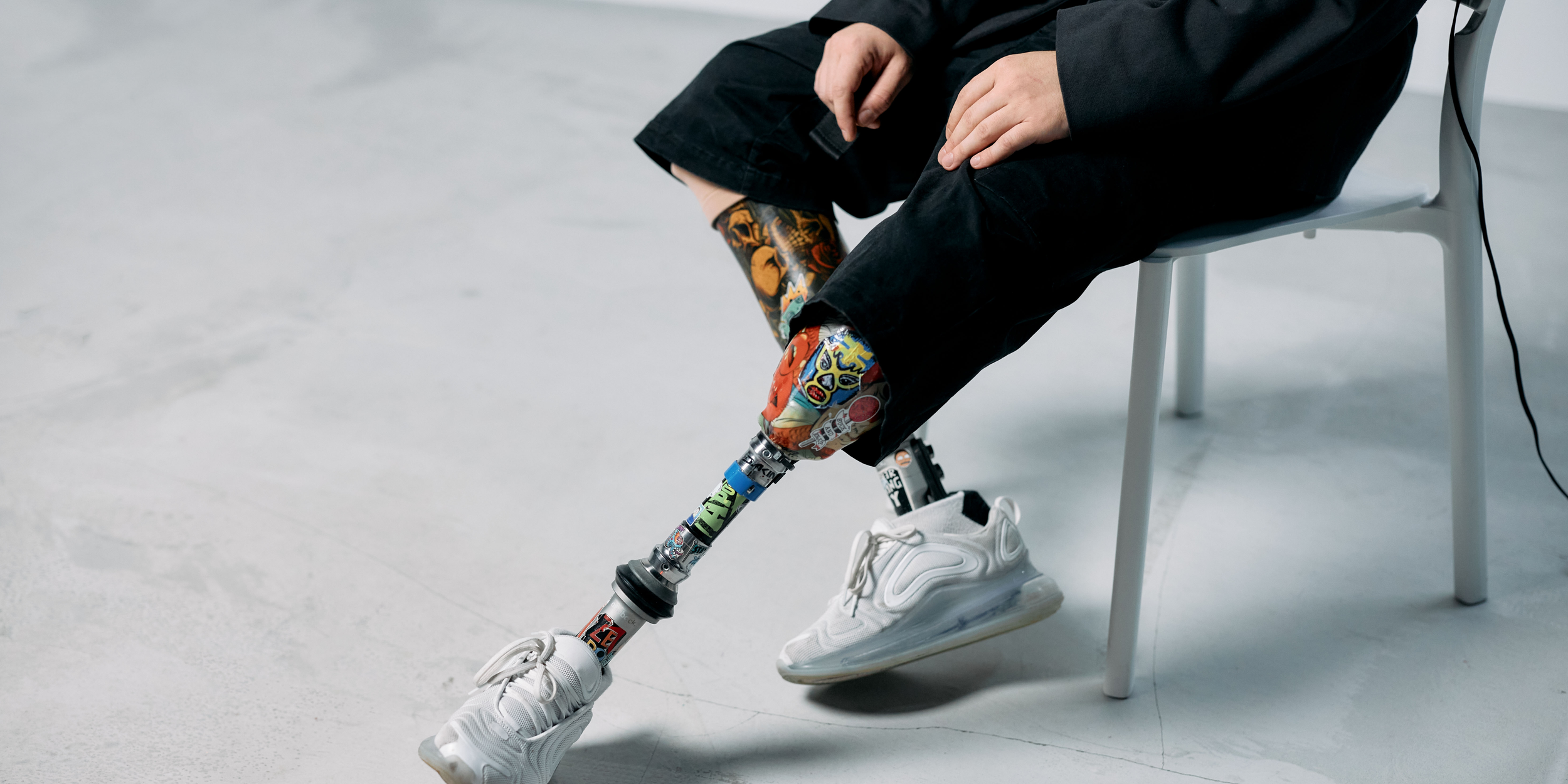 Image of two prosthetic legs personalized with artwork.