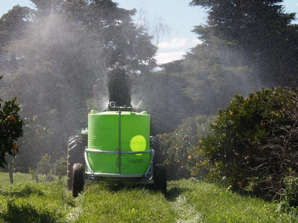 Cyclone Multi-Task 1200 Trailer Sprayer in the orchard