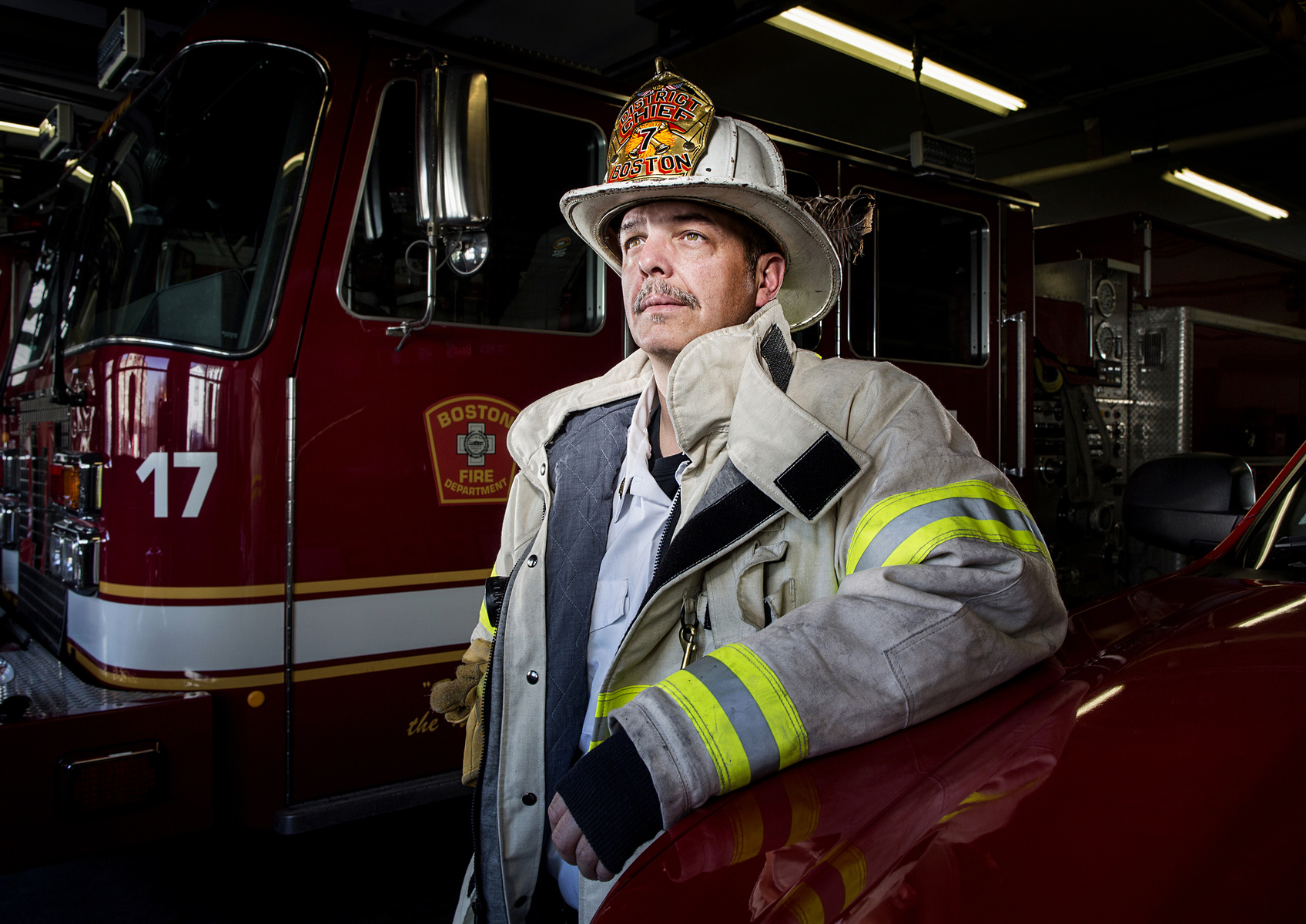Boston Fire Department District 7 Chief Erik Pettaway poses for a portrait inside of his Dorchester fire house on Friday, March 14, 2014.